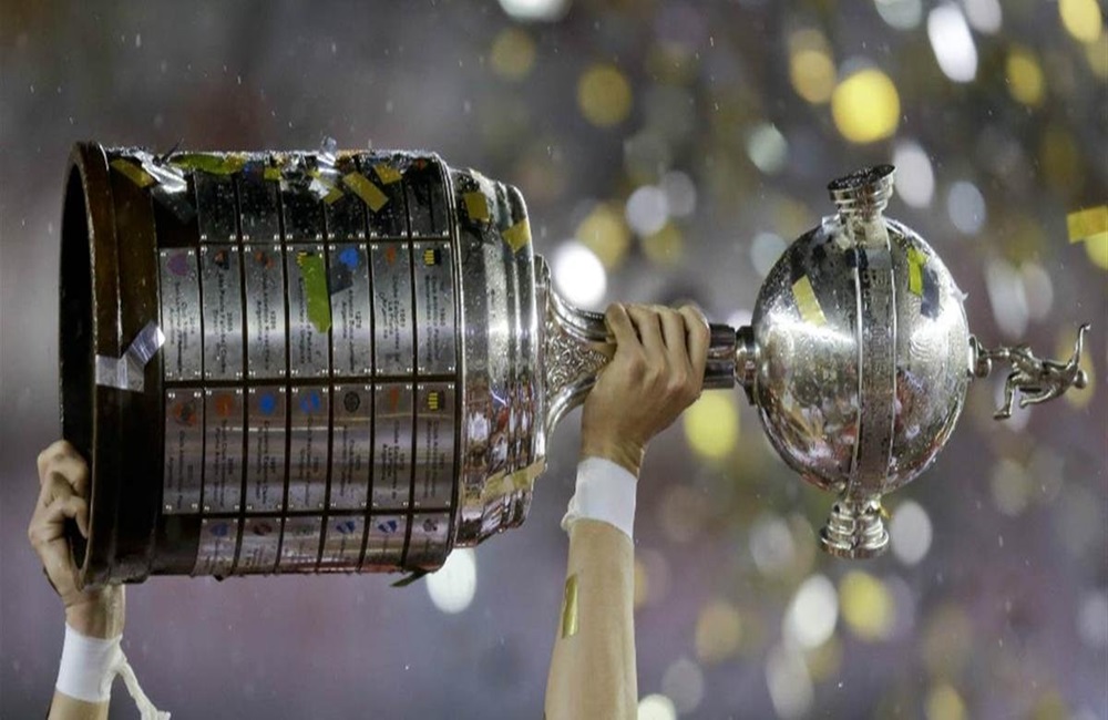 Ir para  <p>Devido aos amistosos internacionais previstos no calend&aacute;rio FIFA, entre 18 e 26 de mar&ccedil;o, a Confedera&ccedil;&atilde;o Sul-Americana de Futebol (Conmebol) decidiu ajustar a agenda de jogos da Libertadores....